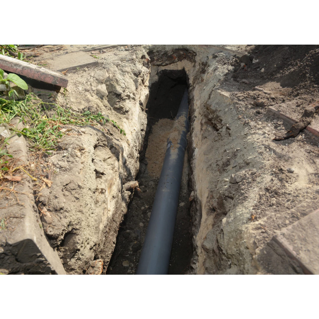 Sewer Line Exposed underneath Soil - General Plumbing
