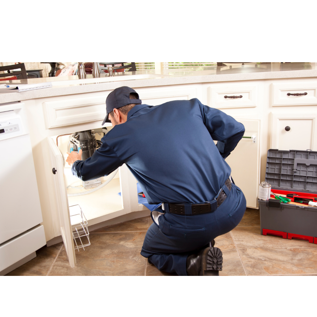 Plumber working on pipes - General Plumbing