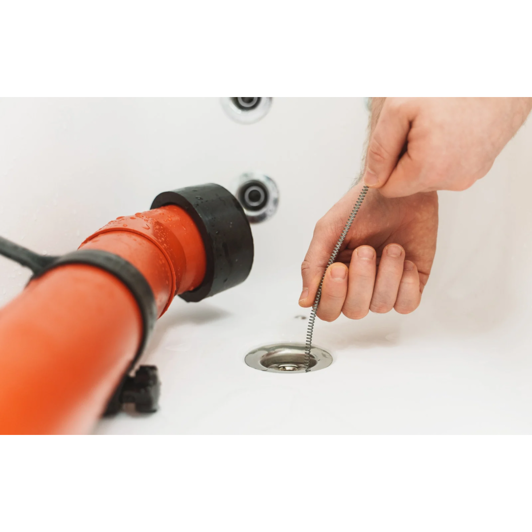 Running of handheld auger through shower drain- General Plumbing